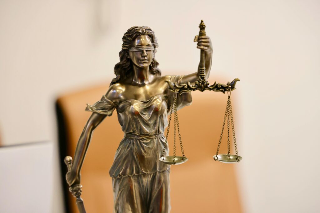 pexels photo 30483129 30483129 Close-up of Lady Justice statue holding scales, symbolizing justice and fairness.